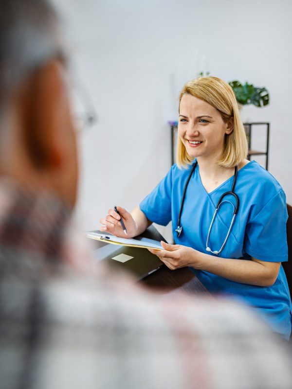 Doctor joyfully consults with patient